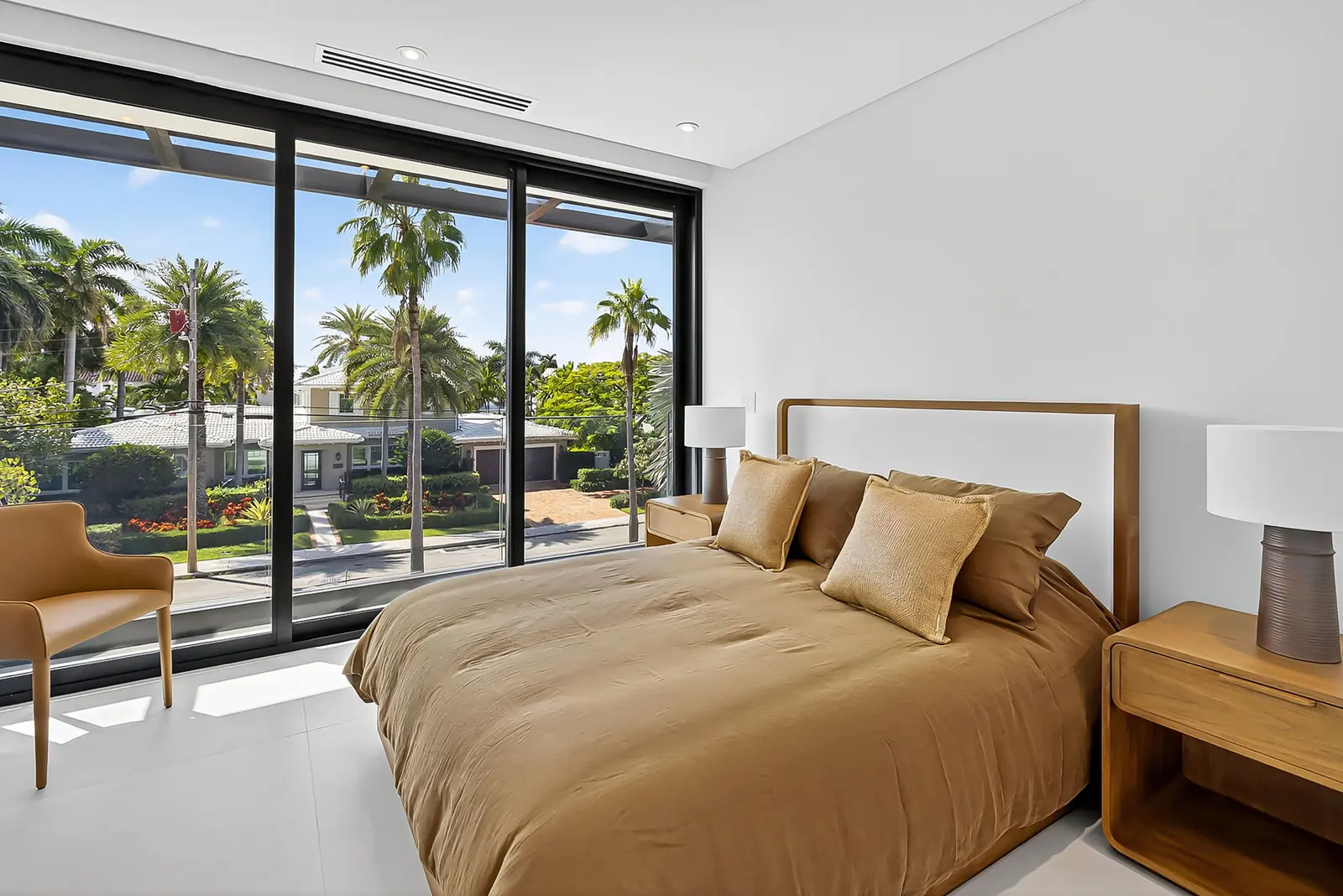 Bedroom with floor-to-ceiling garden view in Fort Lauderdale