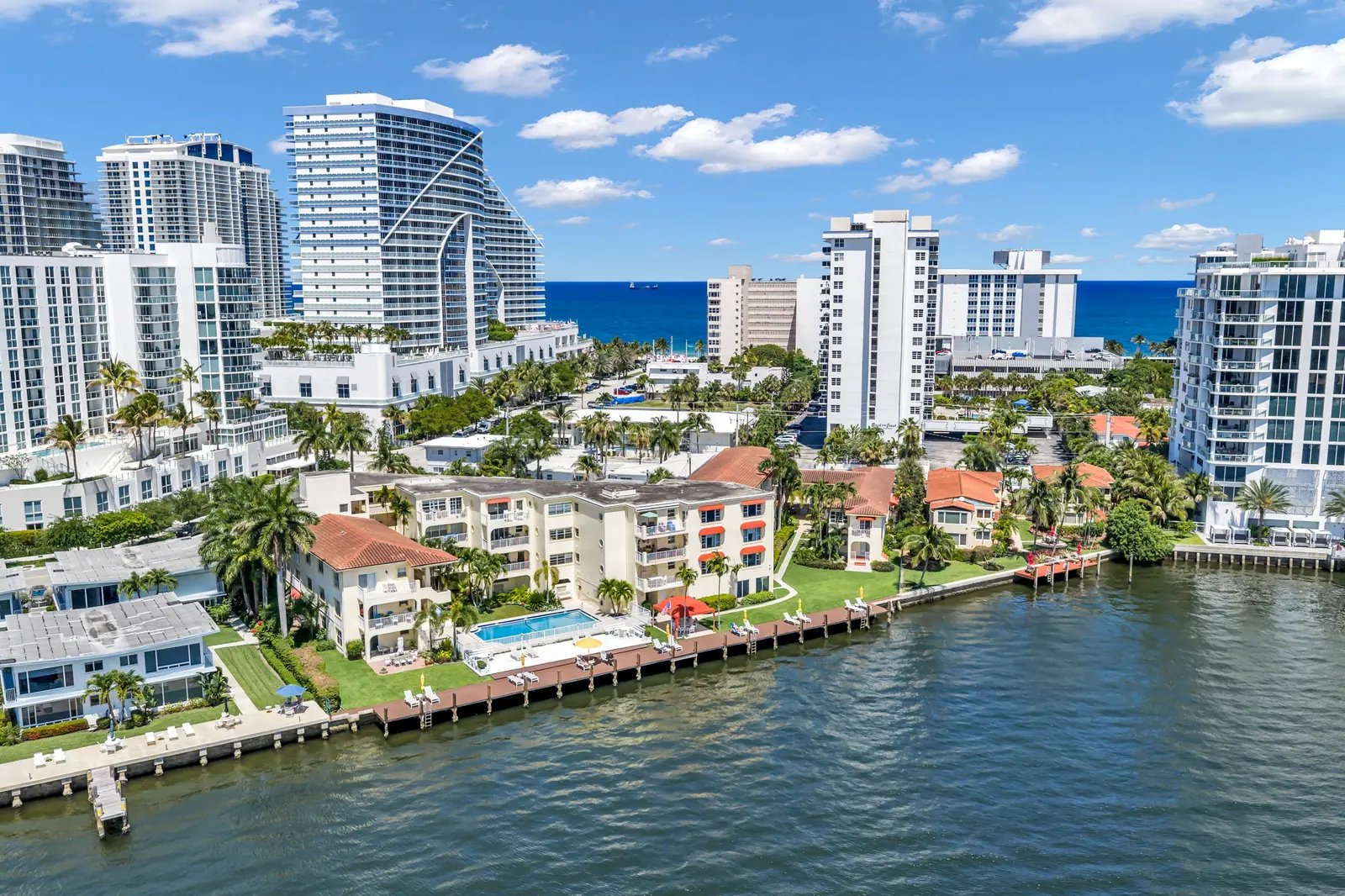 Aerial of waterfront homes on the Fort Lauderdale Intracoastal with beachfront towers