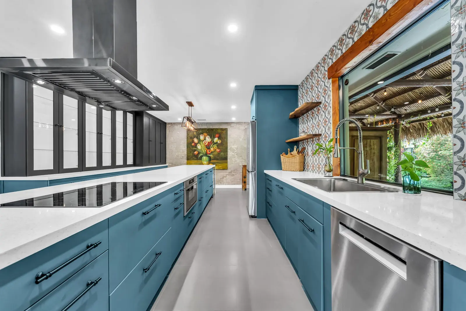 Kitchen with blue cabinetry in Homestead