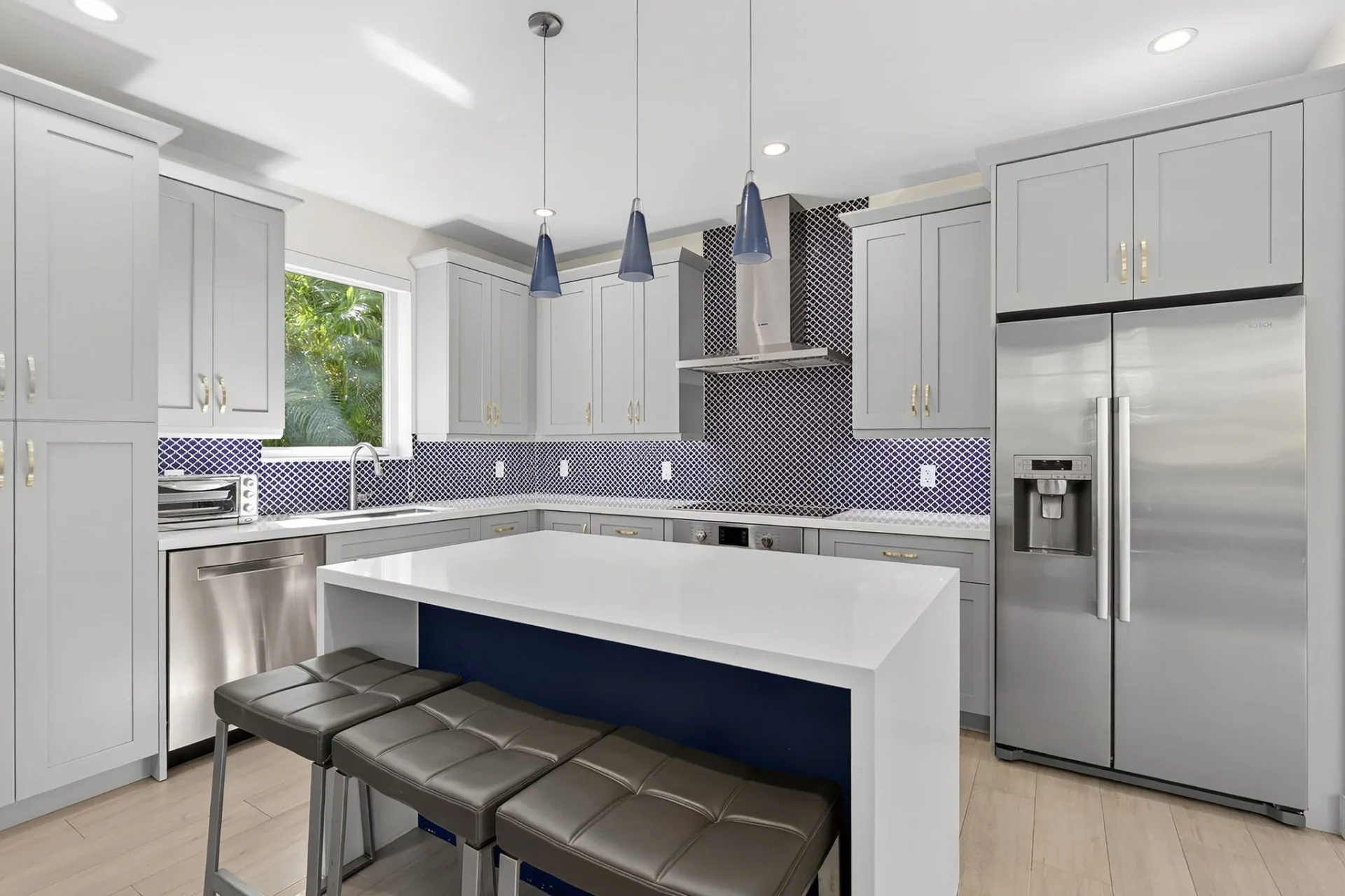 Designer Kitchen with Navy Island - Featured Real Estate Photography by Estate Shutter